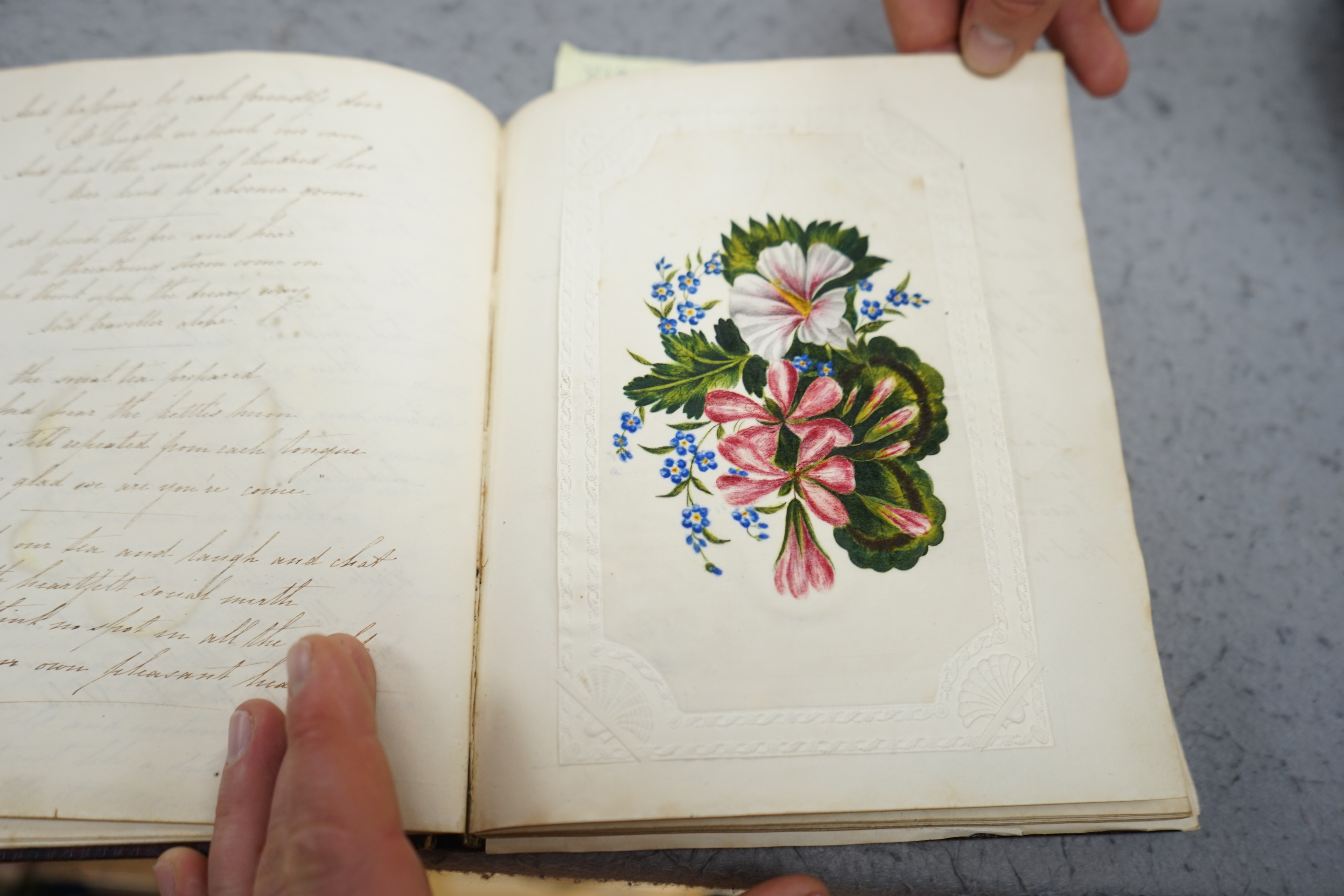 An early 19th century hand written journal, sketch book with scraps, coloured engravings, etc.